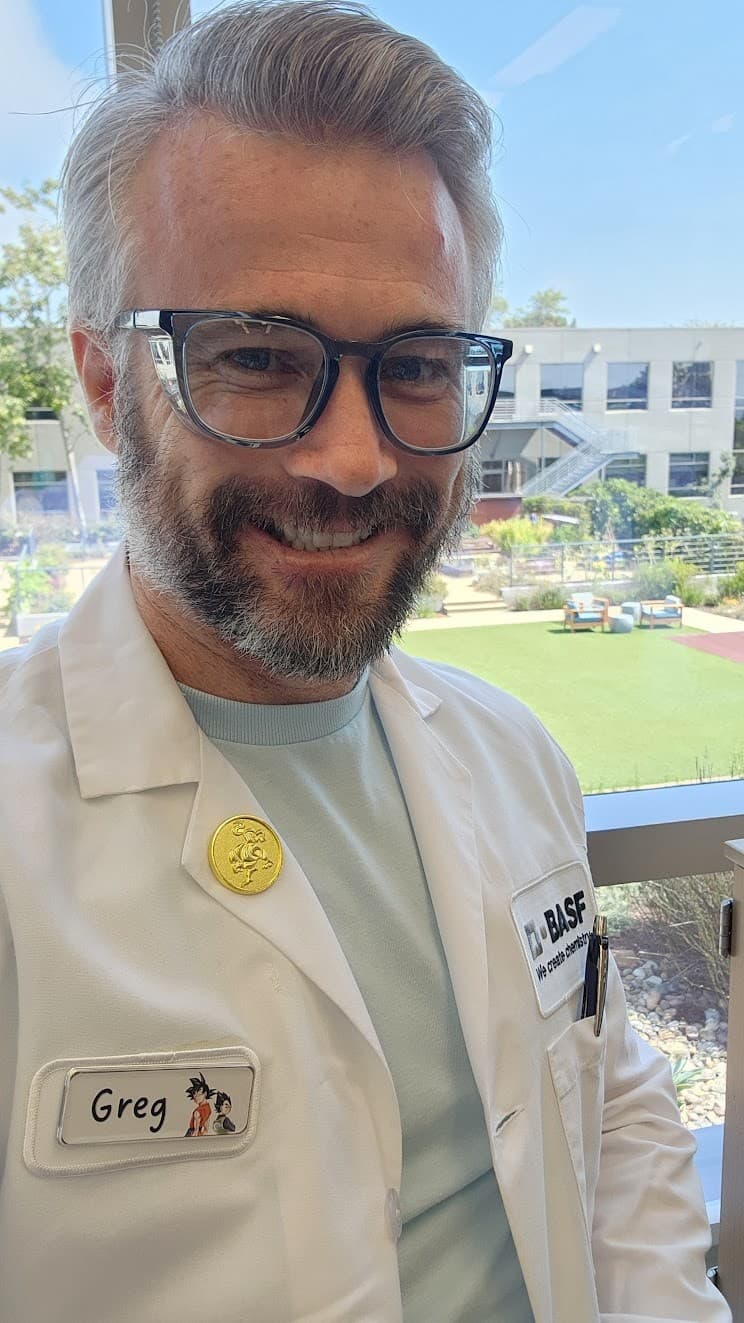 Dr. Greg Newkirk in lab coat at BASF, San Diego
